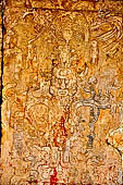 Palenque - Temple of the Foliated Cross (Templo de la Cruz Foliada). Tables of accession of king Serpent-Jaguar II (Chan-Bahlum). Detail of the World Tree as a maize plant ears of maize pictured as human heads. 
