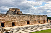 Uxmal - The Nunnery Quadrangle. The Eastern building, behind is the top of Pyramid of the Magician. 