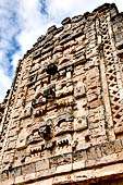 Uxmal - The Nunnery Quadrangle, the North Building. East end of the faade: the fourth mask stack.