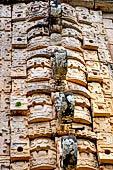 Uxmal - Palace of the Governor, front (East) facade. Mask stack at centre of the facade. 