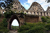 Uxmal - Dovecote Group, South side of House of the Pigeons, the facade of the rooms and vaulted passageway are collapsed. # 