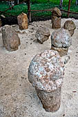 Uxmal - Group of stone phallus near the Pyramid of the Old Woman. 
