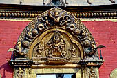 Bhaktapur - Durbar Square - Sun Doka the golden gate of the Royal Palace, a masterpiece of newari craftsmanship, in the torana the tutelary goddess Taleju Bhawani.
