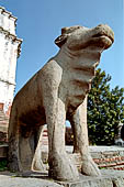 Bhaktapur - Durbar Square - Fasidega Temple (Shiva) on the eastern esplanade of the square, a white sikkara  on top of a platform with stairway flanked by cows and elephants.