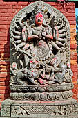 Bhaktapur - Durbar Square - detail of the stone image of  Ugrachandi/Durga (fierce aspect of Parvati).