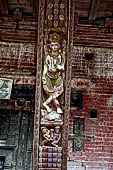 Bhaktapur - Durbar Square. Pashupatinath temple, roof strut with erotic carvings.