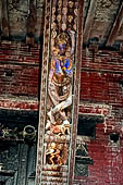 Bhaktapur - Durbar Square. Pashupatinath temple, roof strut with erotic carvings.