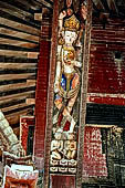 Bhaktapur - Durbar Square. Pashupatinath temple, roof strut with erotic carvings.
