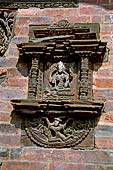 Bhaktapur - Taumadhi Tole - Nyatapola Temple. Detail of the Siddhi Lakshmi shrine at the top of the temple.