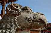 Bhaktapur - Taumadhi Tole - Nyatapola Temple. Gryphon statue of the stairway.