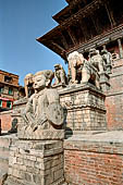 Bhaktapur - Taumadhi Tole - Nyatapola Temple. Statues of the stairway, the mythical wrestlers Jayamel and Phattu.
