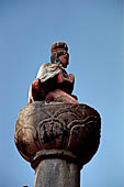 Bhaktapur - in a small courtyard on the southern side of the Tole the Til Mahadev Narayan temple. The kneeled Garuda statue.