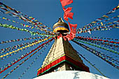Bodhnath - The finial with the famous eyes and the pinnacle with thirteen steps.