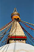 Bodhnath - The finial with the famous eyes and the pinnacle with thirteen steps.