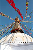 Bodhnath - the huge hemispherical dome of the stupa with the finial with the famous eyes and the pinnacle with thirteen steps. 