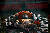 Budhanilkantha - statue of Sleeping Vishnu (Jalasayana Narayan). His crown is never allowed to be seen it is always covered under an accumulation of flowers.
