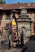 Changu Narayan - detail of the West side of the main temple. Statue of Garuda