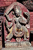 Changu Narayan - stone figure on the south facade to the right of the door.