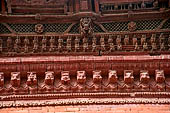 Kathmandu - Durbar Square. Detail of the wooden carved corniche of the Shiva-Parvati temple.