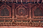 Kathmandu - Durbar Square. Detail of the wooden carved corniche of the Shiva-Parvati temple.