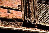 Kathmandu - Durbar Square. Hanuman Dhoka: Lohan Chowk. Detail of the carved wooden windows.