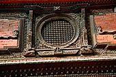Kathmandu - Durbar Square. Hanuman Dhoka: Lohan Chowk. Detail of the carved wooden windows.