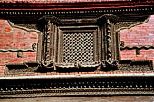 Kathmandu - Durbar Square. Hanuman Dhoka: Lohan Chowk. Detail of the carved wooden windows.