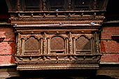 Kathmandu - Durbar Square. Hanuman Dhoka: Lohan Chowk. Carved wooden verandah.