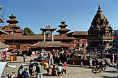 Patan Durbar Square - the southern end of the square with the large lotus pool, the Taleju bell and Krishna temple, in the background the Royal Palace. 
