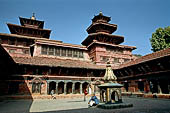 Patan Durbar Square - the Royal Palace, Mul Chowk with in the centre the small Bidya temple. On the background the octagonal Taleju temple. 