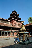 Patan Durbar Square - the Royal Palace, Mul Chowk with in the centre the small Bidya temple. On the background the octagonal Taleju temple. 