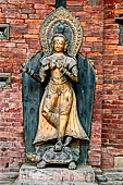 Patan Durbar Square - the Royal Palace, Mul Chowk. Statue of Ganga on the turtle. 