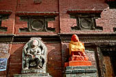 Patan Durbar Square - the statue of Narisingha and Hanuman on the south side of the square in front of the Royal Palace facade. 