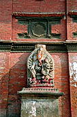 Patan Durbar Square - stone statue of Ganesh on the south side of the square in front of the Royal Palace facade. 