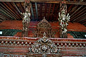 Patan Durbar Square - Narayan Temple, details of the roof struts and of the torana.