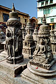 Swayambhunath Stupa - Cluster of thirty-four votive caityas of various types nearby the statue of the Buddha of light.
