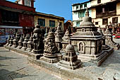 Swayambhunath Stupa - Cluster of thirty-four votive caityas of various types nearby the statue of the Buddha of light.