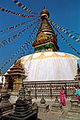 Swayambhunath - The white dome of the stupa with the famous eyes of Wisdom and Compassion of God and the golden pinnacle with thirteen rings.