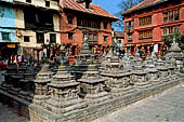 Swayambhunath Stupa - Cluster of thirty-four votive caityas of various types nearby the statue of the Buddha of light.