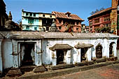 Swayambhunath Stupa - Cluster of thirty-four votive caityas of various types nearby the statue of the Buddha of light.