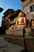 Swayambhunath Hill - big statue of Aksobhya with the gesture to touch earth, near the temple of Santipura.