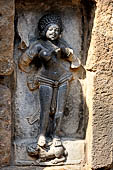 Hirapur - the Sixtyfour Yoginis Temple, Yogini n 44 (clockwise), two armed figure mounted on a lion. Note the curling hair.