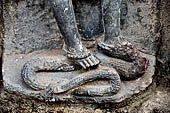 Hirapur - the Sixtyfour Yoginis Temple, detail of the mount of Yogini n 10 (clockwise) a serpent. 