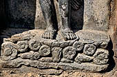 Hirapur - the Sixtyfour Yoginis Temple, detail of the pedestal of Yogini n° 47 (clockwise) with lotus flowers. 