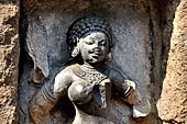 Hirapur - the Sixtyfour Yoginis Temple, head detail of Yogini n° 44 (clockwise) with curling hair. 