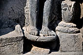 Hirapur - the Sixtyfour Yoginis Temple, detail of the pedestal of Yogini n 45 (clockwise) with a flower vase. 