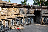 Hirapur - the Sixtyfour Yoginis Temple, eastern view with the temple entrance, from Yogini n 53 (from the far left of the picture) to Yogini n 1 (far right). 