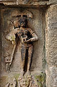 Hirapur - the Sixtyfour Yoginis Temple, Katyayani n 4 (clockwise), with a knife and skull cup, she wears akshamalas on her arms, an attendant hold the umbrella. 