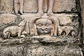 Hirapur - the Sixtyfour Yoginis Temple, detail of the pedestal of Katyayani n 5 (clockwise) with a dog and a jackal. 