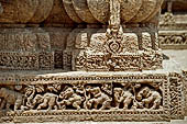 Orissa - Konarak - The Sun Temple. The frieze which runs continously all  around the base of the temple platform, decorated with more than ten thousands elephants . 